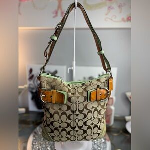 Coach Tan Signature Canvas Shoulder Bag with Green Trim and Cognac Buckles